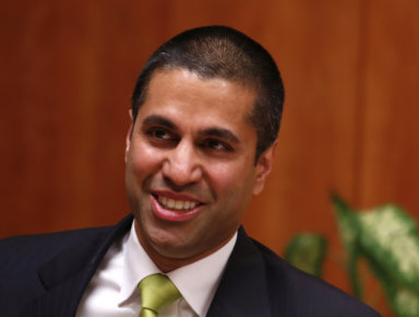 Federal Communications Commission (FCC) commissioner Ajit Pai arrives at a FCC Net Neutrality hearing