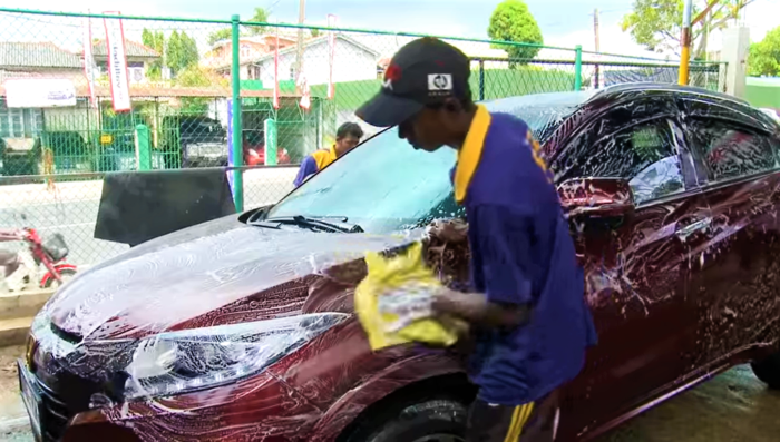 Fiscal General James obtiene más de $500,000 para más de 150 trabajadores de lavado de autos